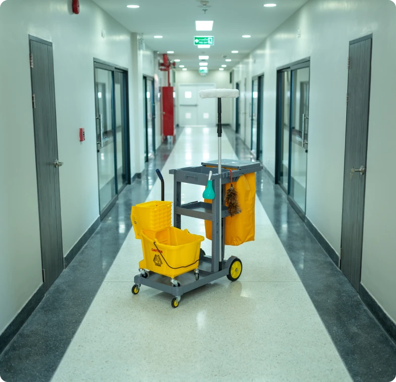 Cleaning cart in empty hospital hallway