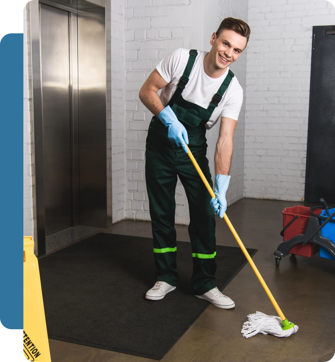 Smiling worker cleaning building floor